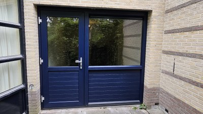 Garagedeur vervangen door kunststof kozijn met kunststof deur in Lelystad
