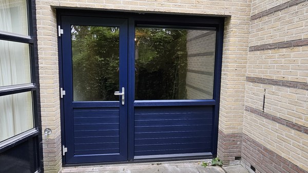 Garagedeur vervangen door kunststof kozijn met kunststof deur in Lelystad